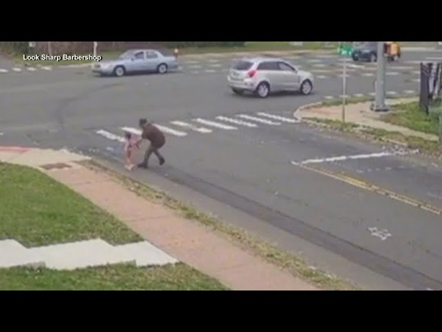 ⁣Barbers save little girl from running into busy intersection in Connecticut