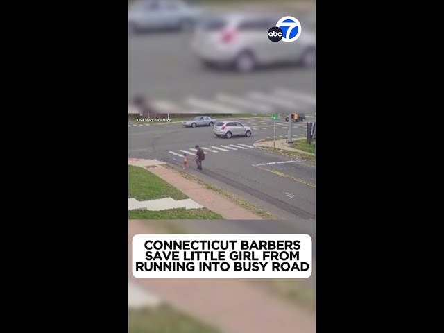 ⁣Barbers save little girl from running into busy intersection