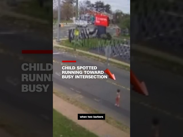 Child spotted running toward busy intersection