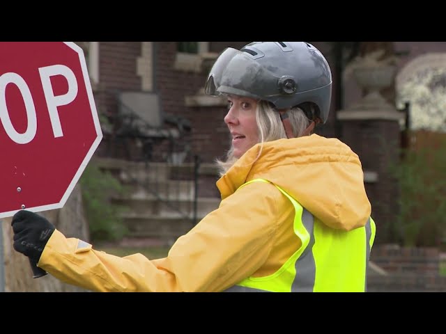 ⁣Denver crossing guard goes viral with safety methods