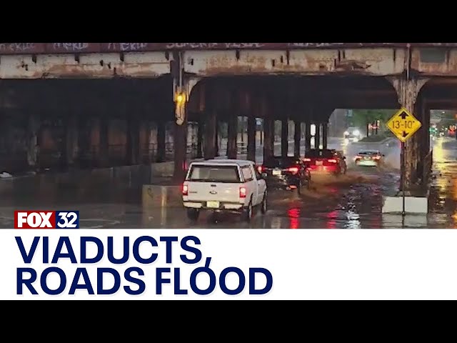 ⁣Heavy rain causes flooding on Chicago roads, viaducts