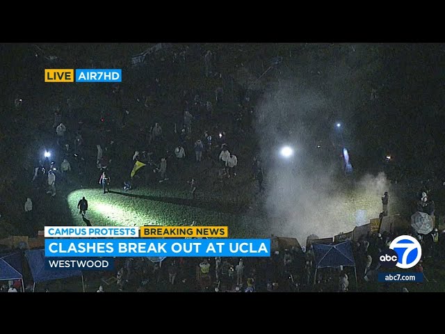 ⁣Protesters fighting, throwing objects as clashes erupt at UCLA