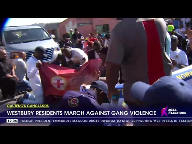 ⁣Westbury residents marching against crime