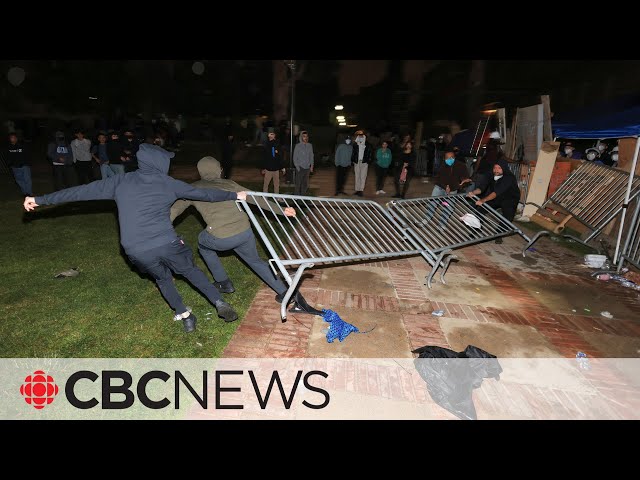 ⁣Supporters of Israel clash with pro-Palestinian protesters at UCLA