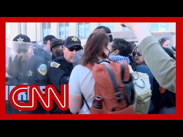 ⁣Police confront protesters at University of Wisconsin