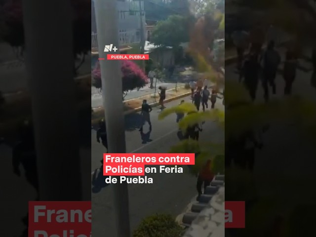 ⁣Pelea entre franeleros y policías en feria de Puebla - N+ #Shorts