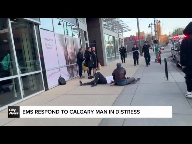 ⁣EMS respond to man in distress in Calgary's downtown core