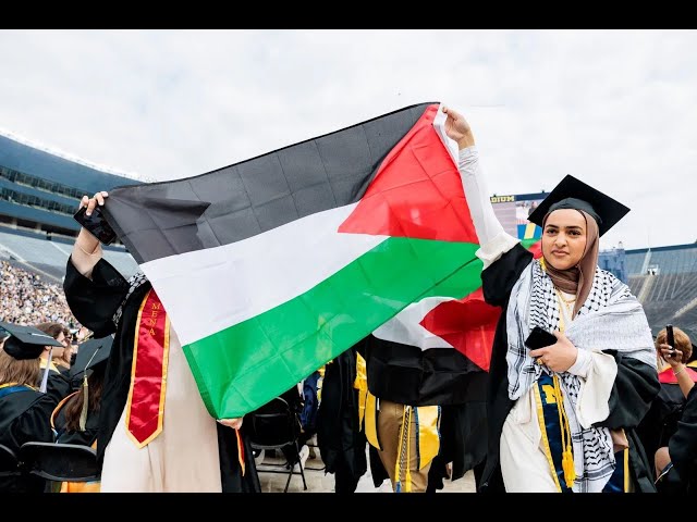 ⁣Student protestors demonstrate in support of Palestine during University of Michigan graduation