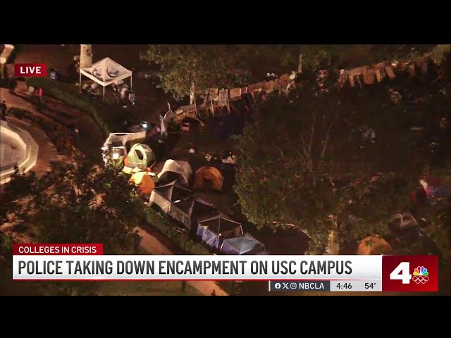 ⁣Police begin to clear protesters from USC campus