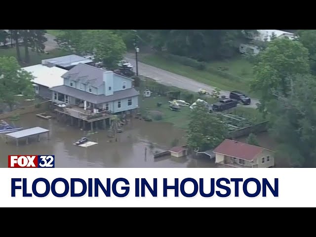 ⁣Neighborhoods under water amid record flooding in Houston