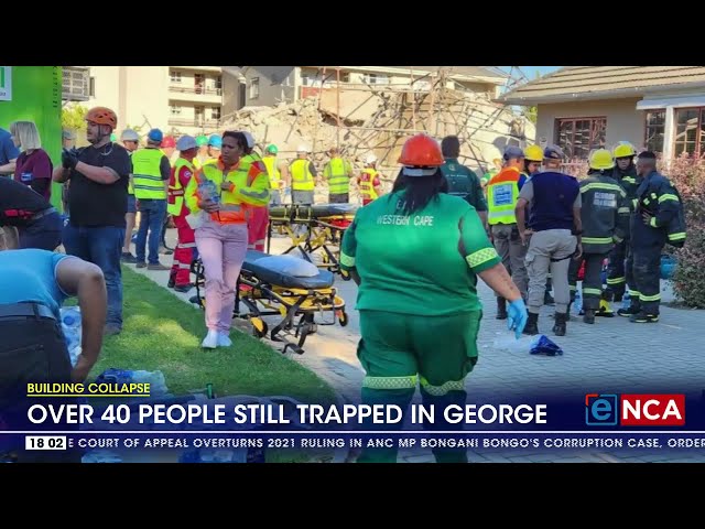 ⁣Over 40 people trapped in a collapsed building in George