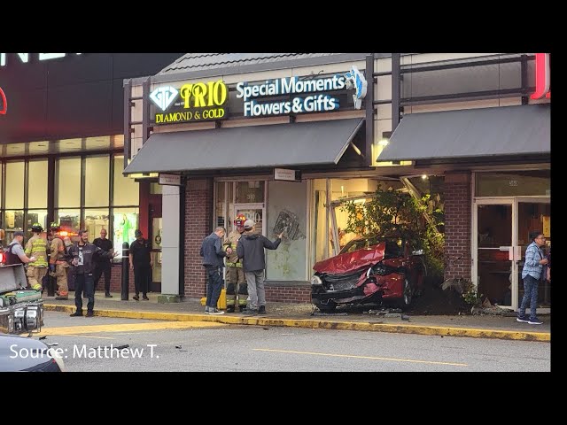 ⁣Video shows car slamming into North Vancouver shop