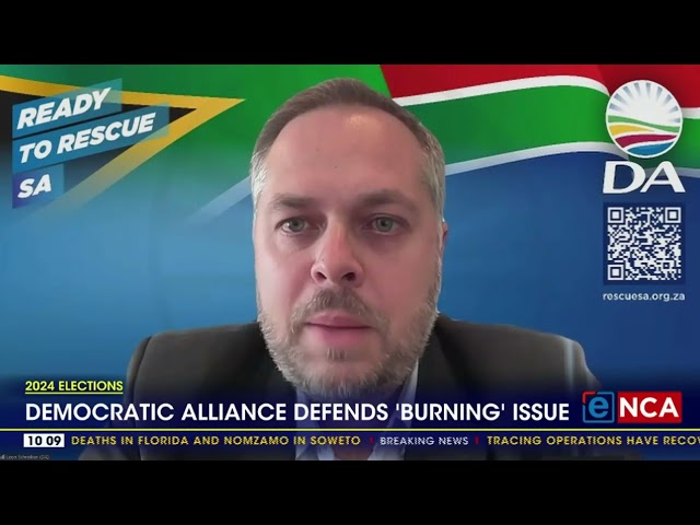 ⁣DA defends 'burning flag' TV ad