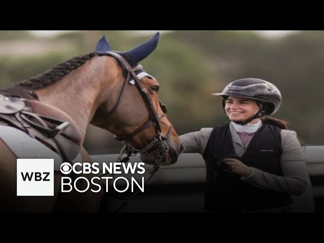 ⁣Massachusetts woman overcomes hearing loss to thrive as horse jumper