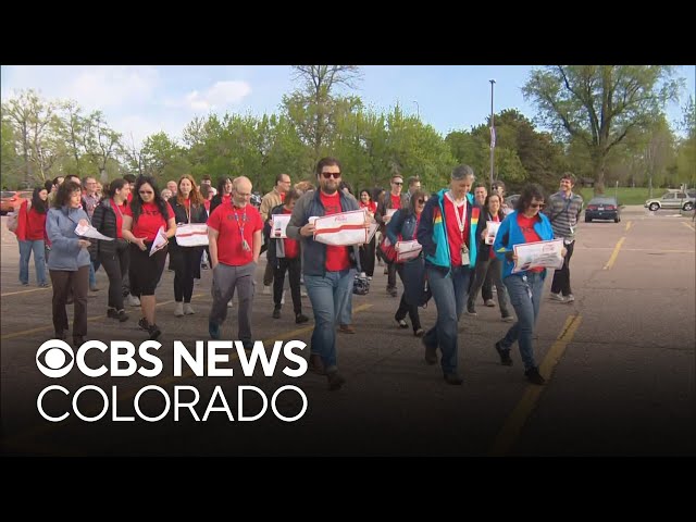 ⁣Teachers in Denver Public Schools participate in walk-in