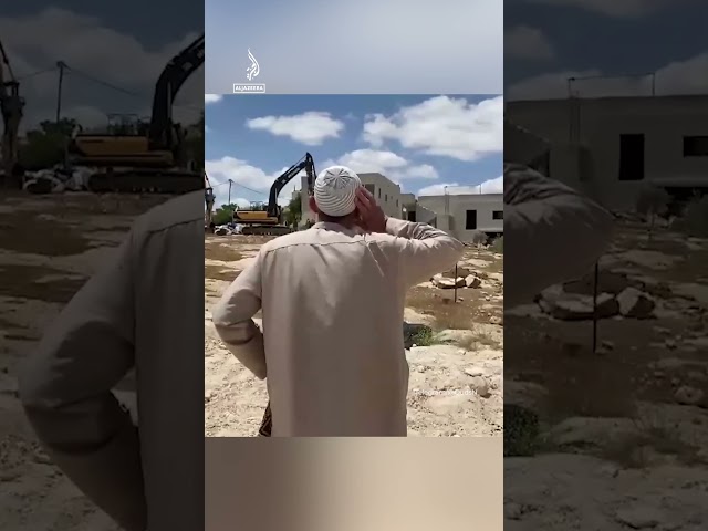 ⁣Palestinian man recites call to prayer in front of Israeli bulldozers