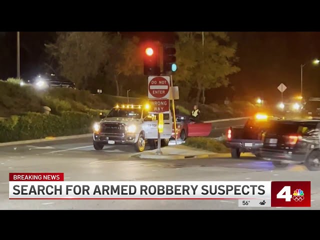 Search for armed robbery suspects who fled vehicle in Century City