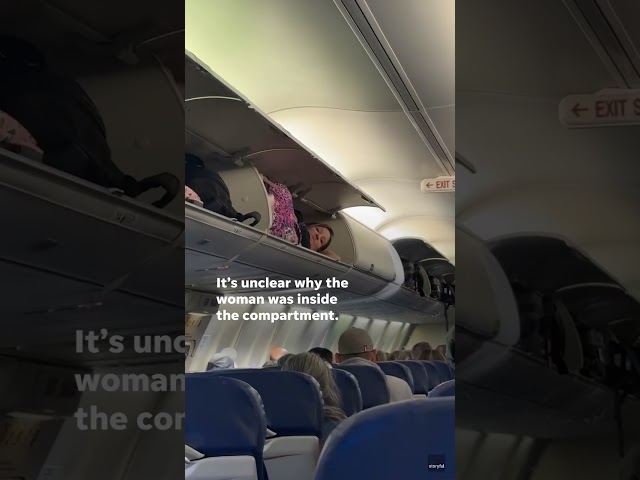 Southwest passenger lounges on a flight without paying for first class #Shorts