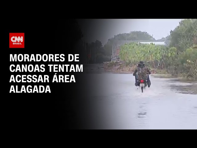 ⁣Moradores de Canoas tentam acessar área alagada | AGORA CNN