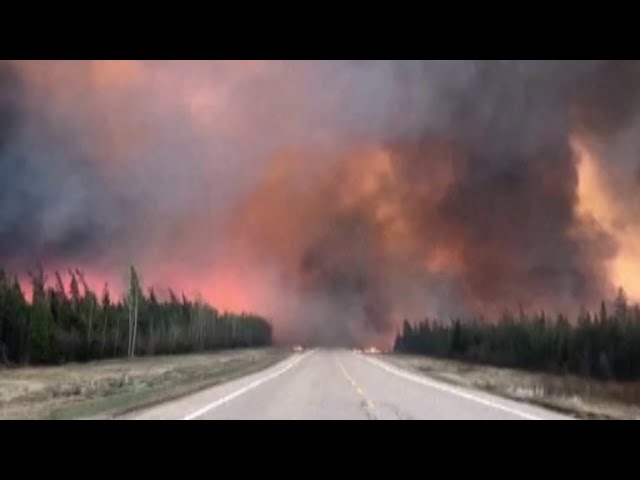 ⁣WATCH | Plumes wildfire smoke fill the sky in Northwest Territories