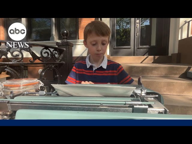 9-year-old typist master is making Mother's Day cards with vintage typewriter