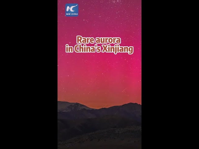 ⁣Rare aurora illuminates night sky in China's Xinjiang