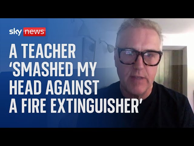 ⁣A teacher 'smashed my head against a fire extinguisher'