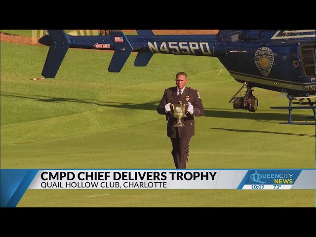 ⁣CMPD Chief Jennings presents Wells Fargo Champ. trophy