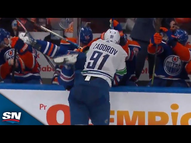 ⁣Canucks' Nikita Zadorov Absolutely Levels Evander Kane Into Oilers Bench