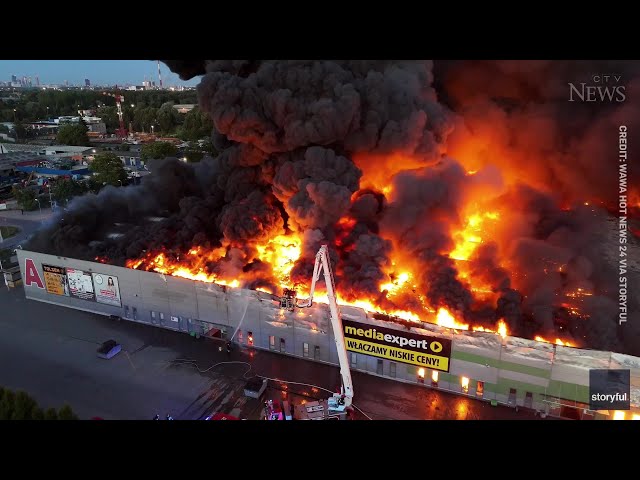 ⁣Massive fire at shopping complex in Poland