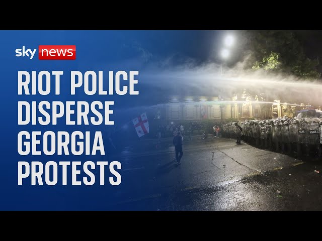 ⁣Georgia: Riot police disperse protesters outside parliament