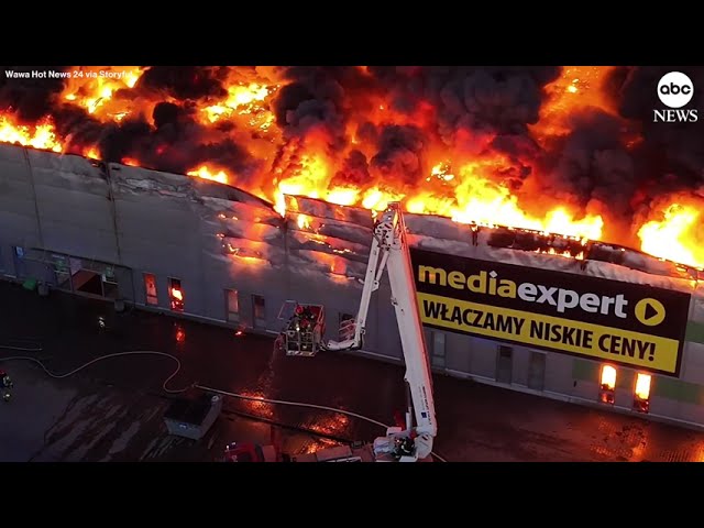 ⁣Massive fire destroys Polish shopping center