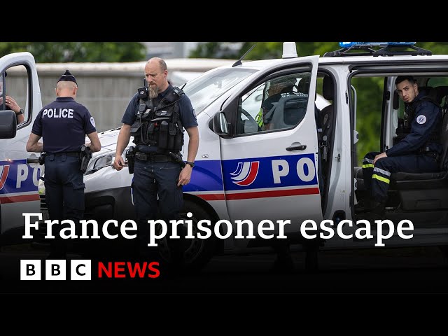 ⁣Manhunt under way in France after two prison officers killed in prisoner escape | BBC News