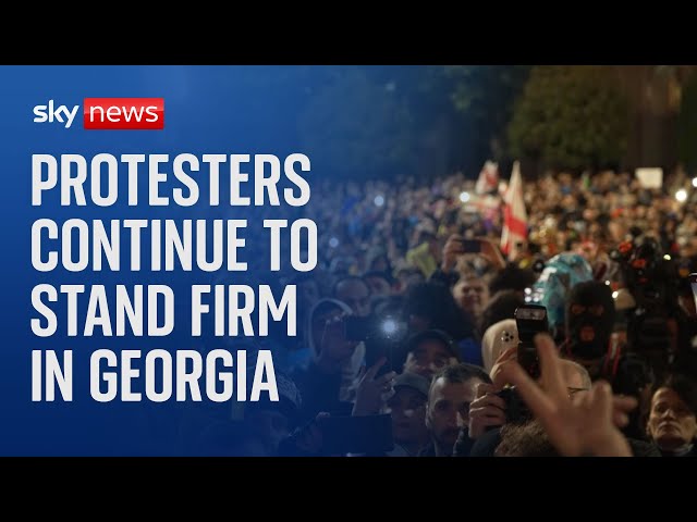 ⁣Georgia: Tens of thousands protest into the night