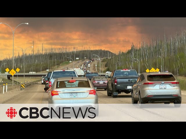 ⁣Thousands ordered to evacuate Fort McMurray as wildfire threatens