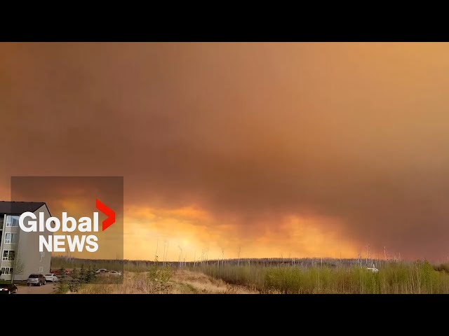 ⁣Fort McMurray evacuations underway as wildfires rage out of control