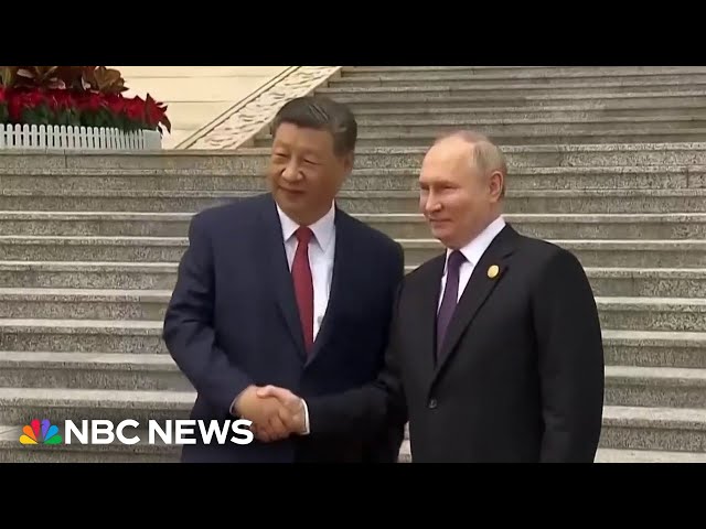Russia's Putin greeted by Xi Jinping at the start of a two-day visit to China
