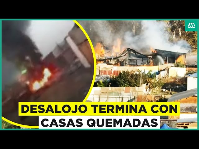 ⁣Desalojo en campamento en Cerro Navia: Casas de terrenos terminan quemadas