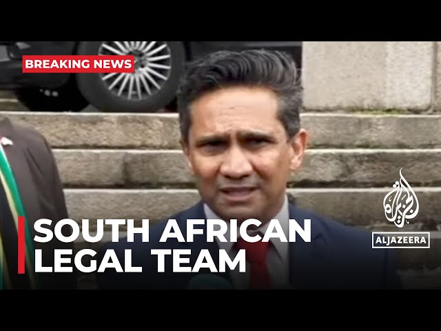 ⁣South African legal team are speaking to the press outside the world court at the Hague