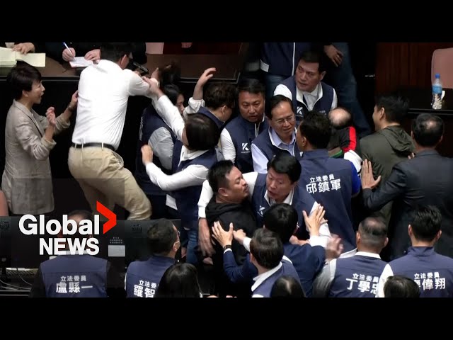 ⁣Taiwan lawmakers brawl in parliament over chamber reforms dispute