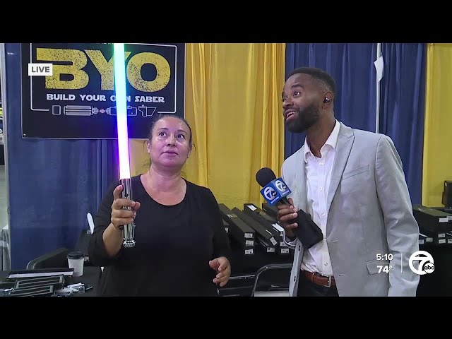 ⁣Checking out the Build Your Own Lightsaber booth at Motor City Comic Con