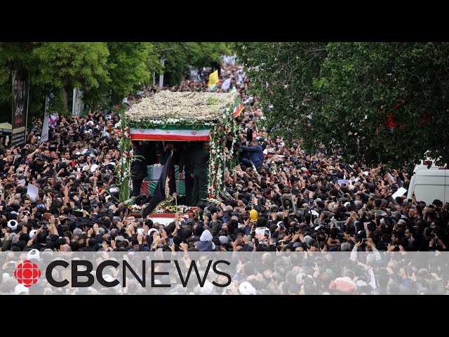 ⁣Thousands crowd streets for funeral procession of Iranian President Raisi