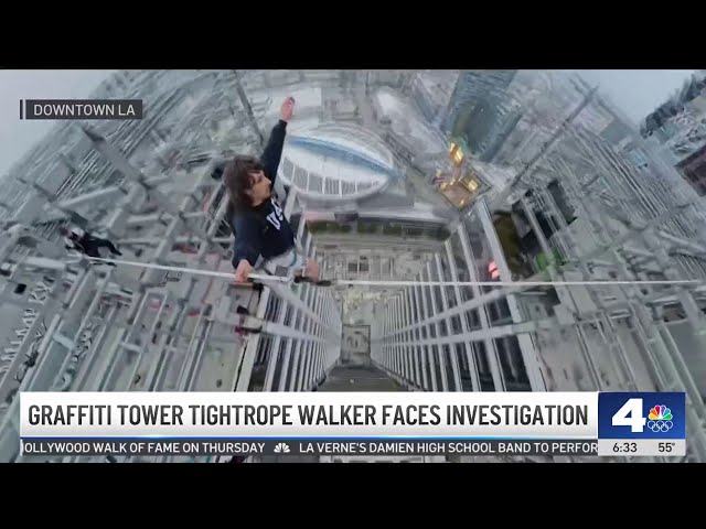 ⁣Police investigating Graffiti Towers tightrope stunt