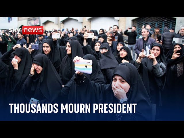 ⁣Thousands mourn Iran's president and others celebrate his death