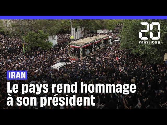 ⁣Des milliers de personnes assistent à la procession funèbre du président iranien