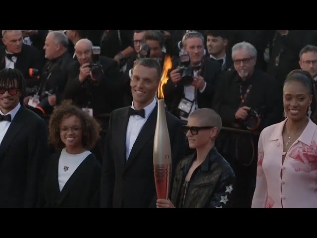 ⁣Olympic torch arrives at Cannes Film Festival