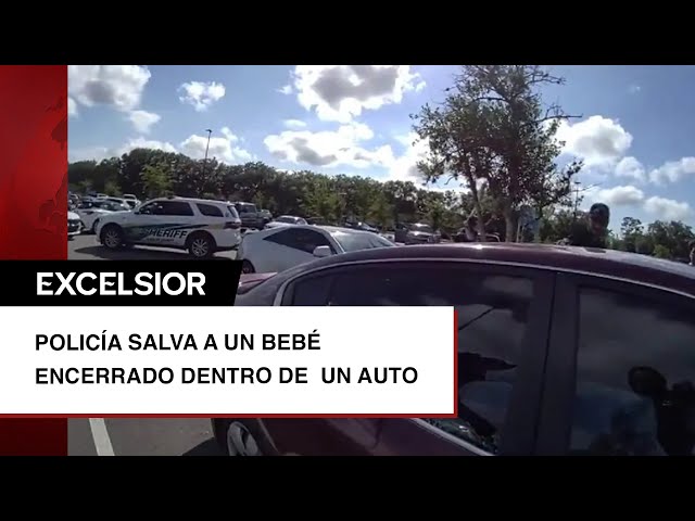 ⁣Policía rescata a bebé atrapado dentro de un auto; captan VIDEO de la hazaña