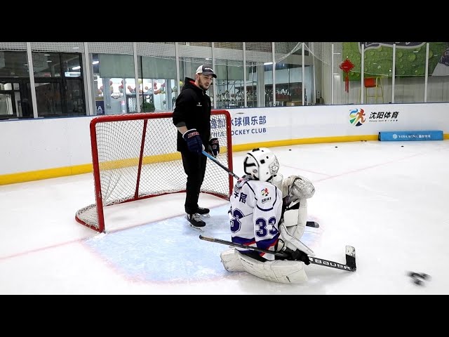 ⁣GLOBALink | Russian hockey professionals help hone skills of Chinese children