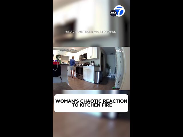 ⁣Woman's chaotic reaction to kitchen fire