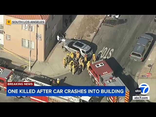 ⁣Person dies after being pinned between SUV and building in South LA